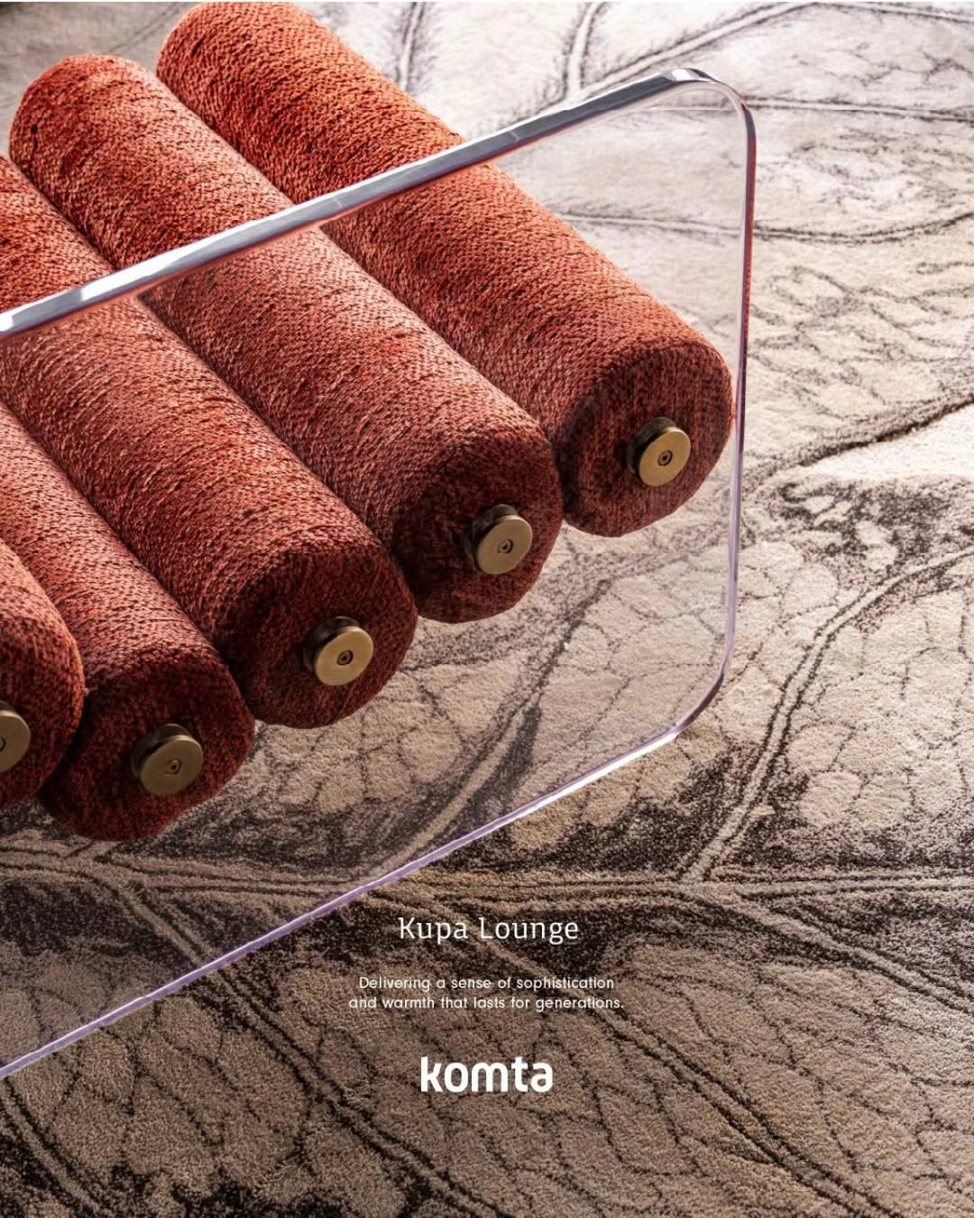Komta campaign portrait on lounge chair